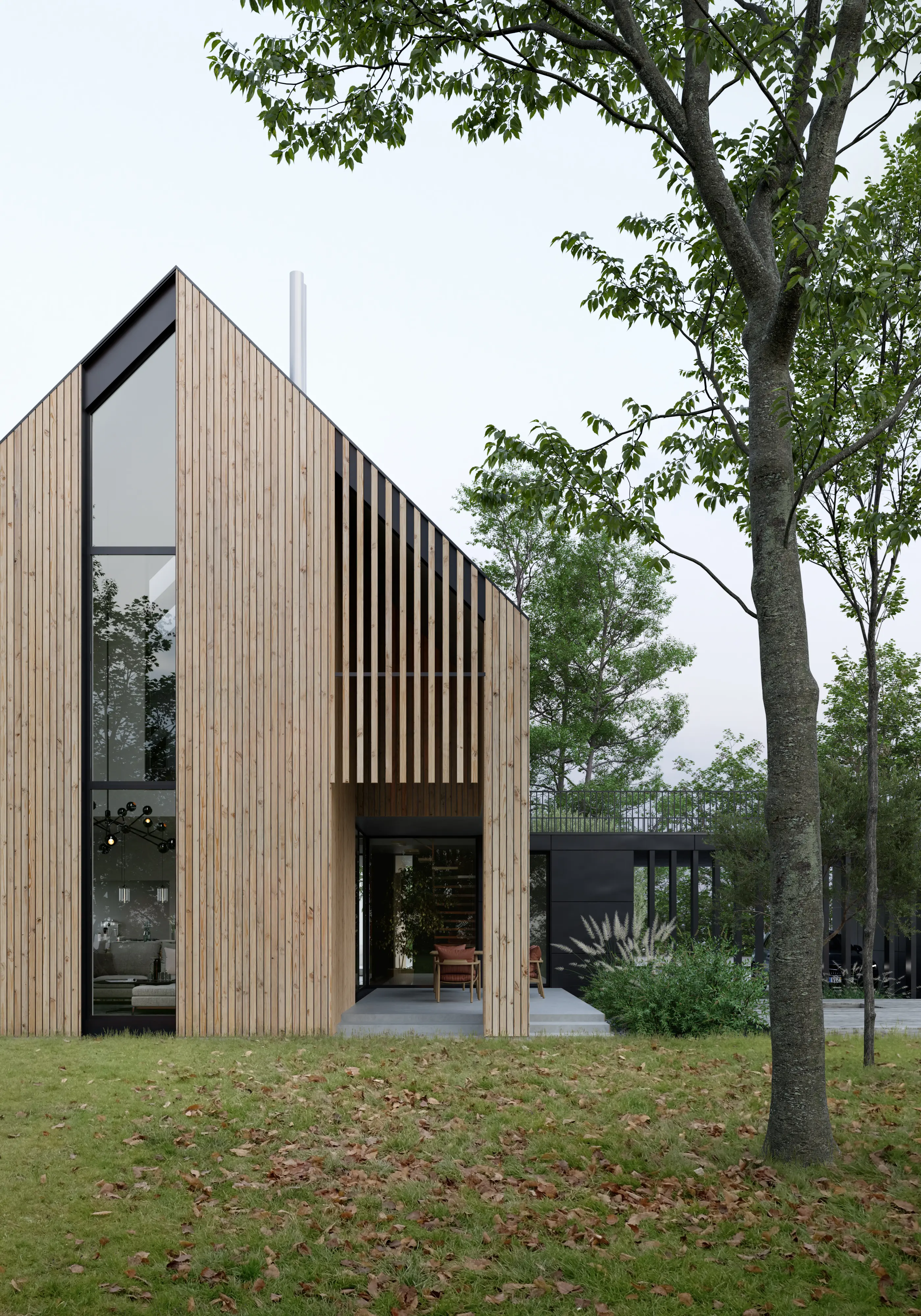 Pale timber Green Harbor house with a recessed entrance porch, seen across an autumn lawn.
